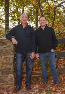 Both doctors posing outside in the woods